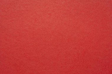 Geri dönüştürülmüş pamuk kumaştan yapılmış kırmızı el yapımı Hint kağıdının arka planı ve dokusu