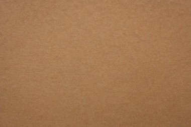 Geri dönüştürülmüş pamuk kumaştan yaratılan kumtaşı kahverengi el yapımı Hint kağıdının arka planı ve dokusu