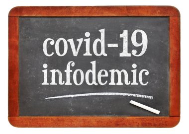 covid-19 infodemic - coronavirus pandemic information overload concept, white chalk text on a vintage slate blackboard clipart