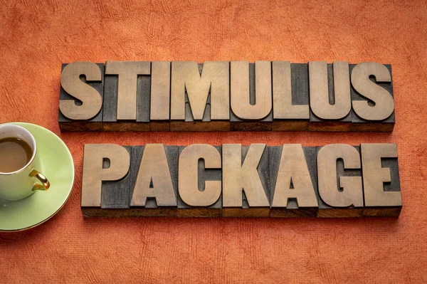 Stimulus Package Word Abstract Vintage Letterpress Wood Type Coffee Textured — Stock Photo, Image