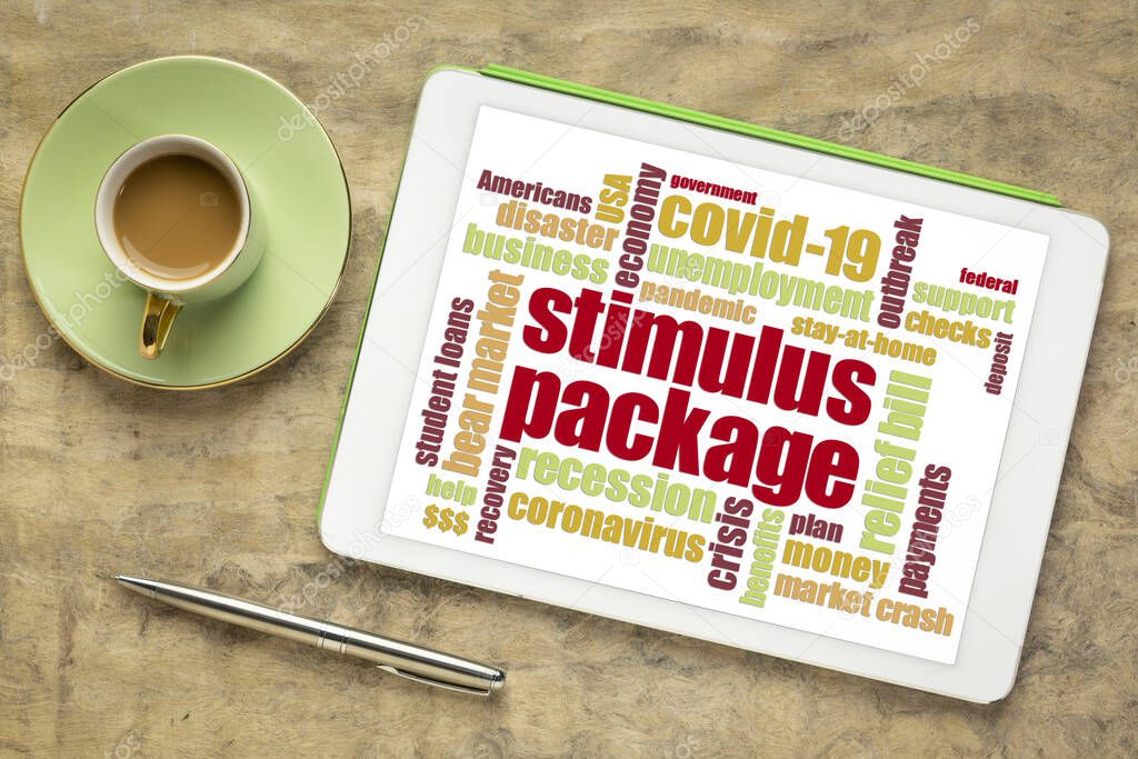stimulus package word cloud on a digital tablet, relief bill during covid-19 coronavirus pandemic concept