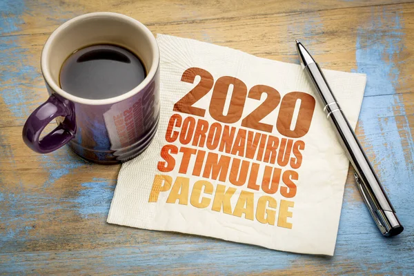 2020 coronavirus stimulus package word abstract on a napkin with a cup of coffee, relief bill during covid-19  pandemic and recession