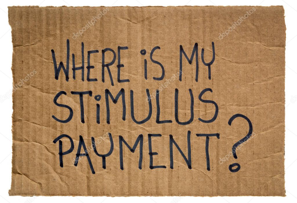Where is my stimulus payment? Handwriting on a piece of cardboard. Economic recession and relief bill during coronavirus covid-19 pandemic.
