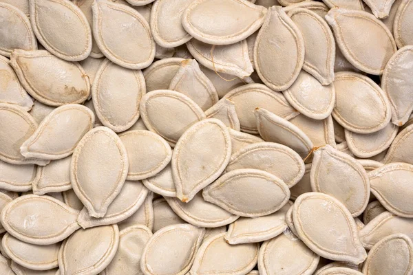 Closeup Background Texture Raw Pumpkin Seeds Shells Top View — Stock Photo, Image