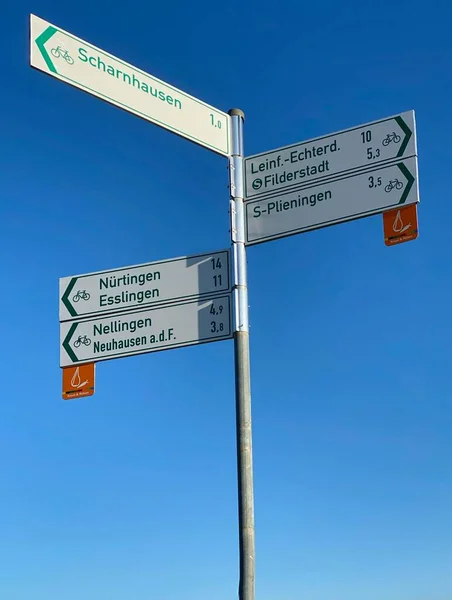 Roadsigns are marking directions to various destinations in Stuttgart, Esslingen and Ostfildern for cycling. — Stock Photo, Image