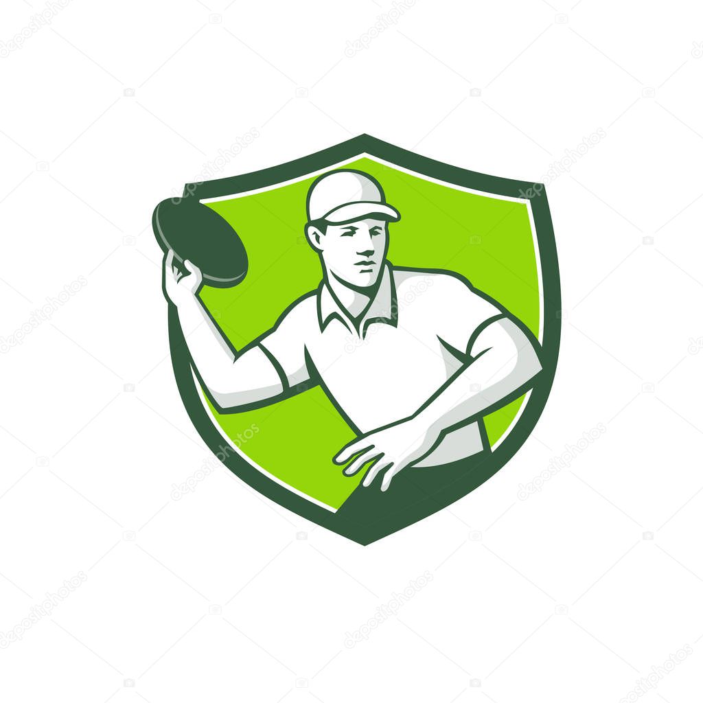 Mascot icon illustration  of an disc golf player throwing a flatball or frisbee set inside crest or shield shape viewed from front on isolated background in retro style.