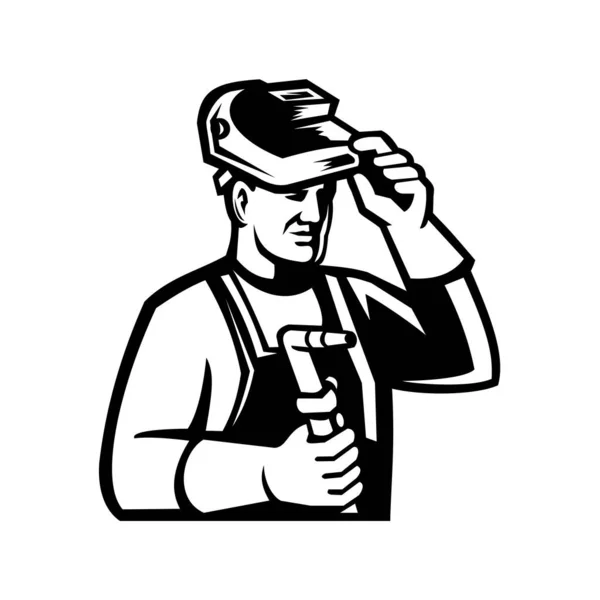 复古黑白风格的焊机升降面罩头和手握焊枪从侧面看孤立背景的吉祥物图标 — 图库矢量图片