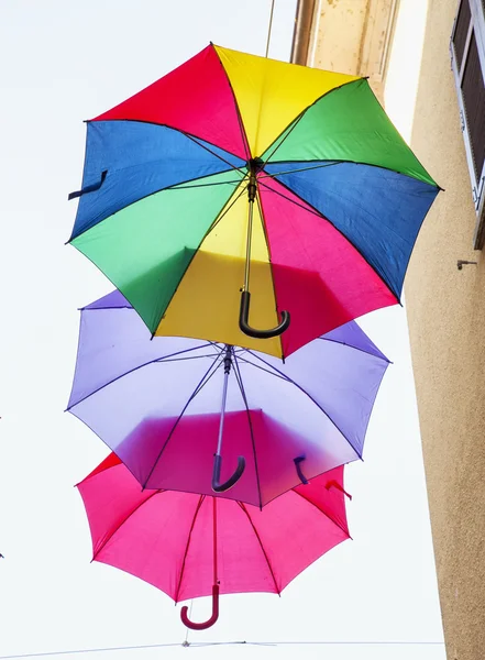 Flying colorful umbrellas — Stock Photo, Image