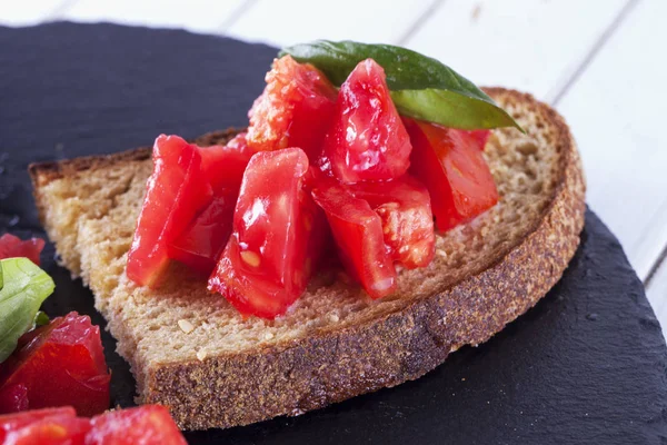 Bruschetta with tomatoes — Stock Photo, Image