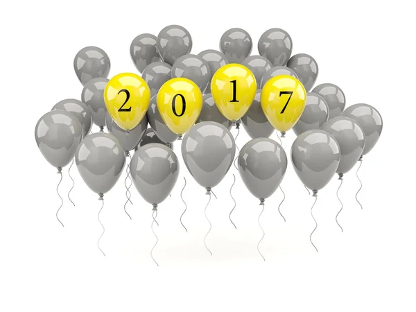 Желтые шарики с новогодним знаком 2017 года — стоковое фото
