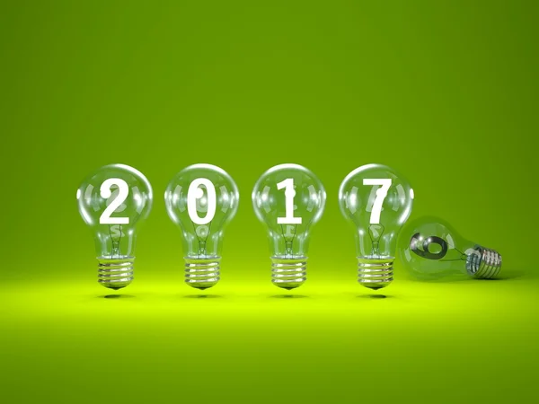 2017 New Year sign inside light bulbs — Stock Photo, Image