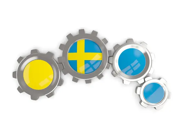 Флаг Швеции, металлические шестерни с цветами флага — стоковое фото