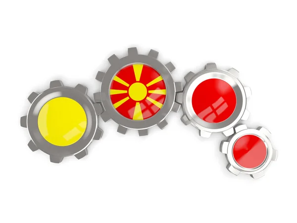 Прапор Македонії, металеві шестерні з кольорами прапора — стокове фото