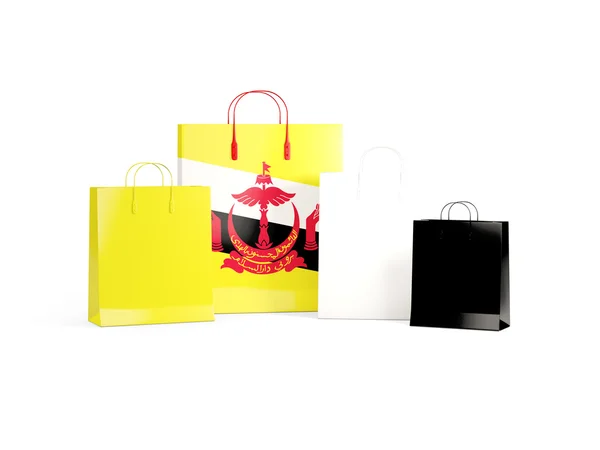 Bandeira de brunei em sacos de compras — Fotografia de Stock