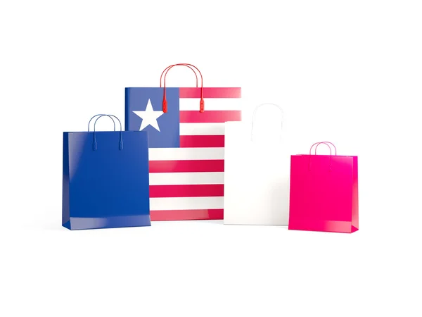 Bandiera della Liberia sulle borse della spesa — Foto Stock