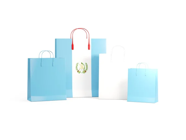 Bandera de guatemala en bolsas de compras —  Fotos de Stock