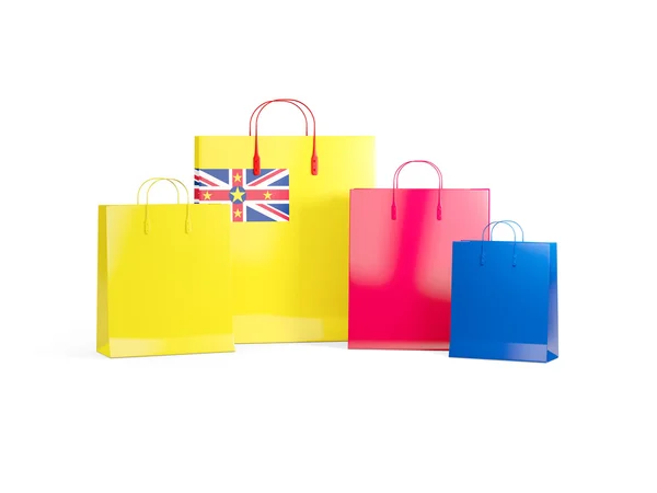 Σημαία του Νιούε στις τσάντες για ψώνια — Φωτογραφία Αρχείου