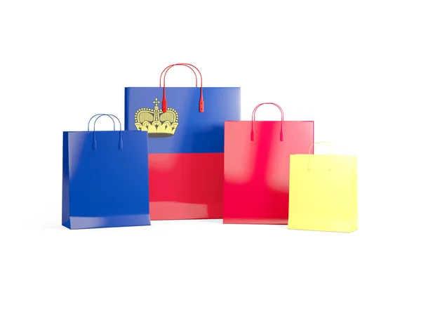 Vlag van liechtenstein op shopping tassen — Stockfoto