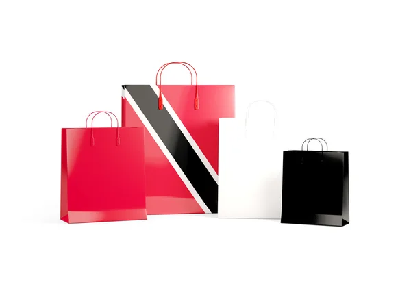 Vlag van trinidad en tobago op shopping tassen — Stockfoto