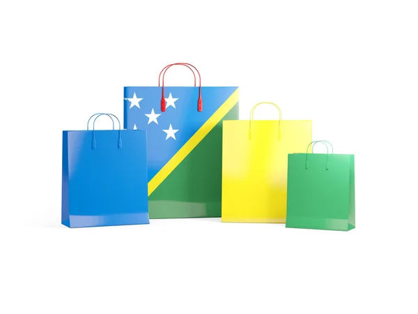 Bandera de las islas Salomón en bolsas de compras — Foto de Stock