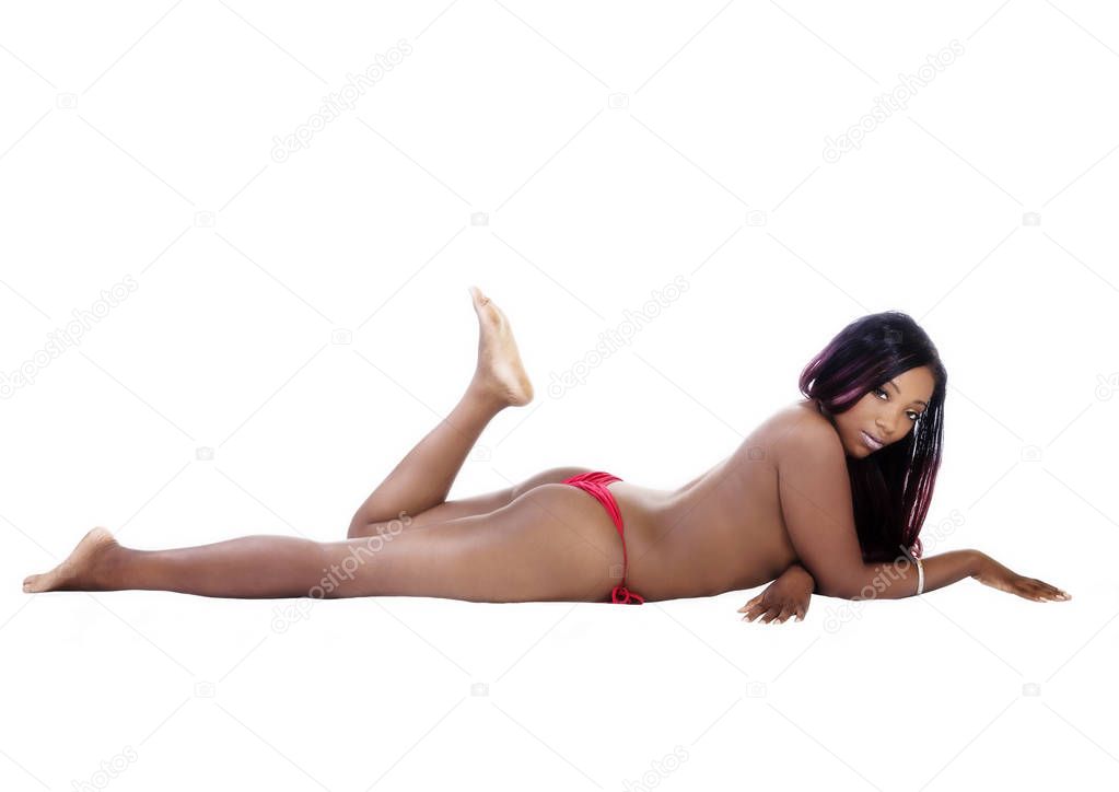 Topless Attractive African American Woman On Stomach Red Bikini