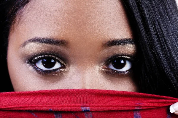 Tight Shot of Attractive African American Woman Eyes Over Red Sh — Photo