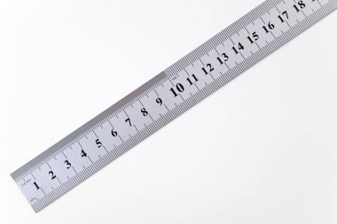 Metric, imprial steel ruler, isolated on white.