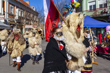 Hungary Mohacs Feb 23, 2020: Participants at the Buso walking festival-ending the day before Ash Wednesday. People wearing traditional masks include folk music, masquerading, parades and dancing.