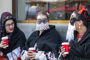 Hungary Mohacs Feb 23, 2020: Participants at the Buso walking festival-ending the day before Ash Wednesday. People wearing traditional masks include folk music, masquerading, parades and dancing.