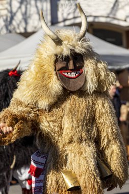 Hungary Mohacs Feb 23, 2020: Participants at the Buso walking festival-ending the day before Ash Wednesday. People wearing traditional masks include folk music, masquerading, parades and dancing.
