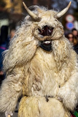 Hungary Mohacs Feb 23, 2020: Participants at the Buso walking festival-ending the day before Ash Wednesday. People wearing traditional masks include folk music, masquerading, parades and dancing.