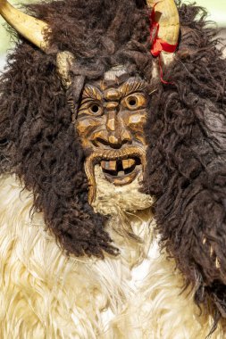 Hungary Mohacs Feb 23, 2020: Participants at the Buso walking festival-ending the day before Ash Wednesday. People wearing traditional masks include folk music, masquerading, parades and dancing.