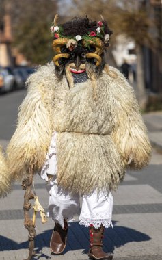 Hungary Mohacs Feb 23, 2020: Participants at the Buso walking festival-ending the day before Ash Wednesday. People wearing traditional masks include folk music, masquerading, parades and dancing.