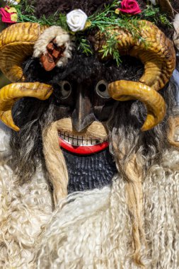 Hungary Mohacs Feb 23, 2020: Participants at the Buso walking festival-ending the day before Ash Wednesday. People wearing traditional masks include folk music, masquerading, parades and dancing.