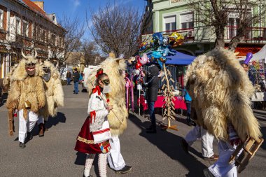 Hungary Mohacs Feb 23, 2020: Participants at the Buso walking festival-ending the day before Ash Wednesday. People wearing traditional masks include folk music, masquerading, parades and dancing.