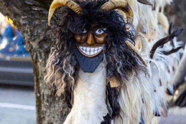 Hungary Mohacs Feb 23, 2020: Participants at the Buso walking festival-ending the day before Ash Wednesday. People wearing traditional masks include folk music, masquerading, parades and dancing.