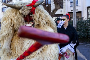 Hungary Mohacs Feb 23, 2020: Participants at the Buso walking festival-ending the day before Ash Wednesday. People wearing traditional masks include folk music, masquerading, parades and dancing.
