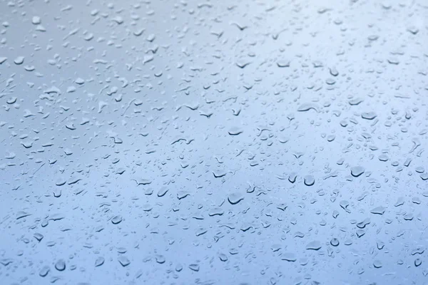 Краплі дощу на віконному склі — стокове фото