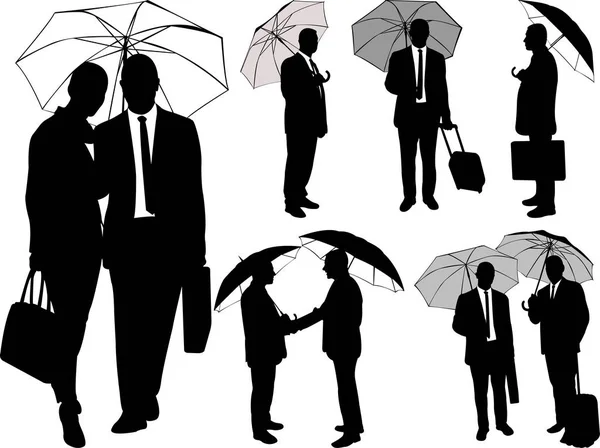Man and woman under umbrella silhouettes - vector — Stock Vector