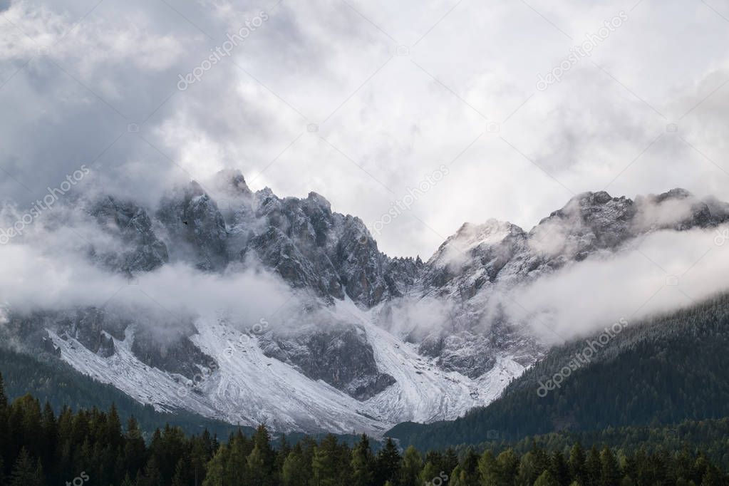 Misty mountain scene in Dolomites mountain