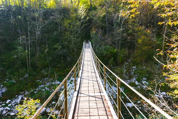 Old wooden bridge over Soca river — Stock Photo, Image