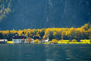 Lake Konigssee with world famous St Bartholomae clipart