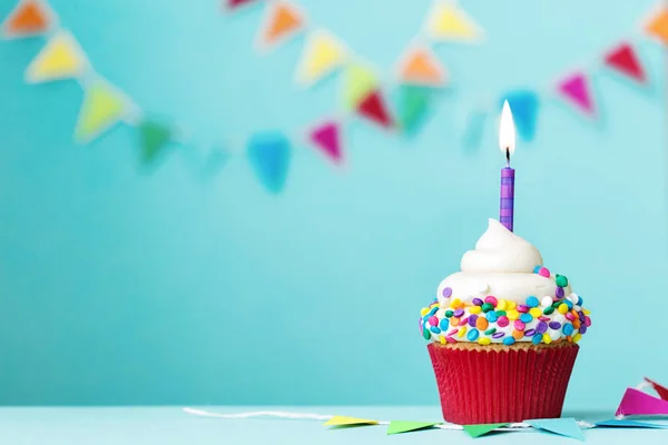 Birthday cupcake with one candle — Stock Photo, Image