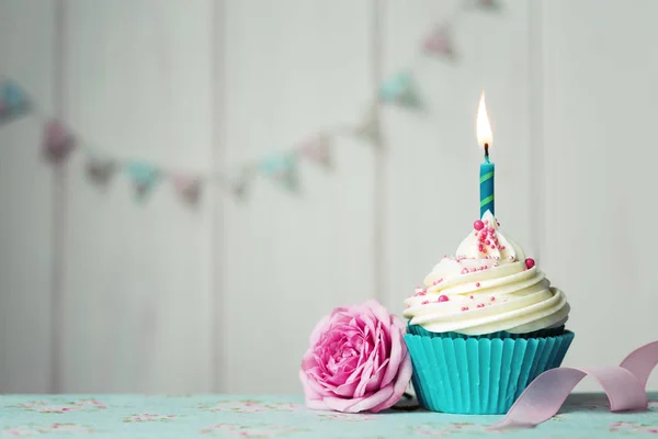 Birthday cupcake with one candle — Stock Photo, Image