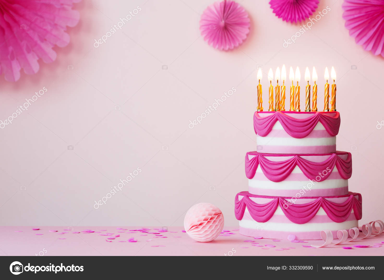Birthday party with pink tiered cake Stock Photo by ©RuthBlack 332309590