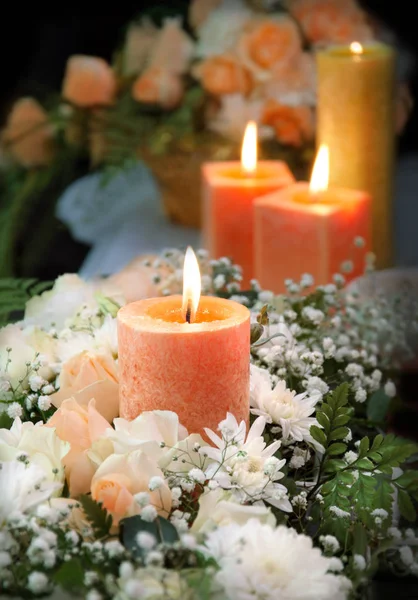 Candle on floral background — Stock Photo, Image