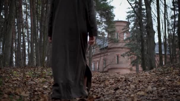 Mysterious Monk Wizard Hooded Robe Walks Throw Autumn Forest Medieval — Stock Video