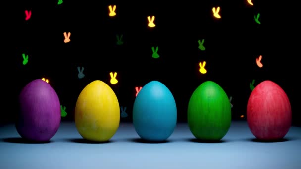 Happy Easter Concept Row Bright Colored Eggs Black Background Flashing — Stock Video