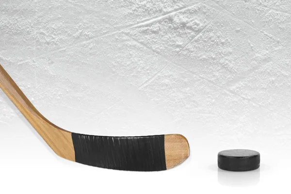 Hockey stick and puck — Stock Photo, Image