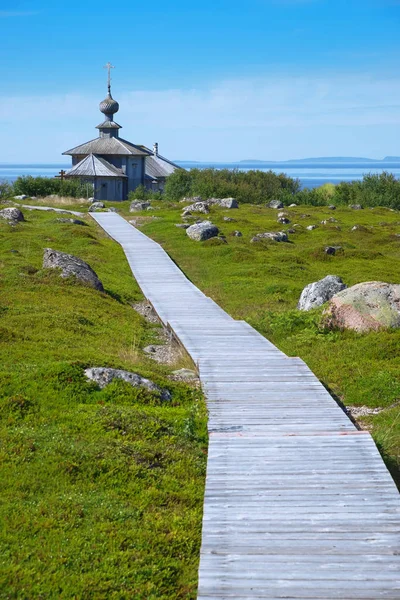 The wooden church at the seaside — Stock Photo, Image
